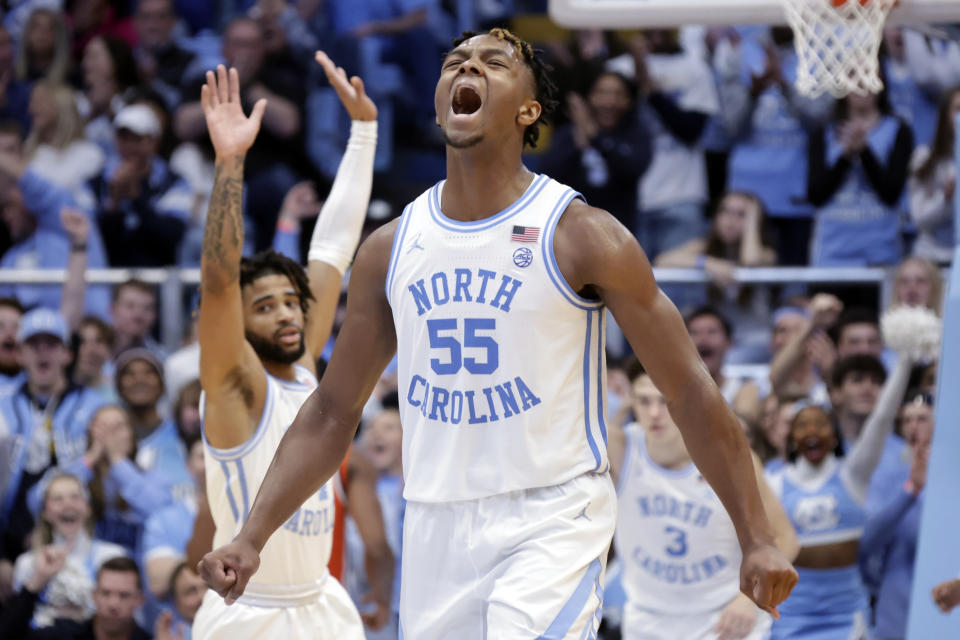 North Carolina forward Harrison Ingram (55) celebrates after a teammate scored a 3-point basket during the second half of an NCAA college basketball game against Syracuse, Saturday, Jan. 13, 2024, in Chapel Hill, N.C. (AP Photo/Chris Seward)