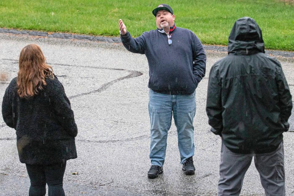 Homeowner and resident Amanda Clappsy, Homeowners' Association President Michal Porter, and neighbor Matt Allen argue at the Westminster community in Wilmington, Tuesday, April 2, 2024. Clappsy, after clearing with the community’s prior board, reconfigured her driveway so she could park her RV but has been having problems with the new civic association board due to her RV.