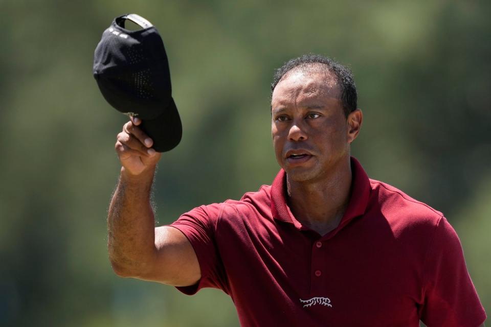 Tiger Woods waves after his final round at the Masters golf tournament at Augusta National Golf Club in April 2024 (AP)