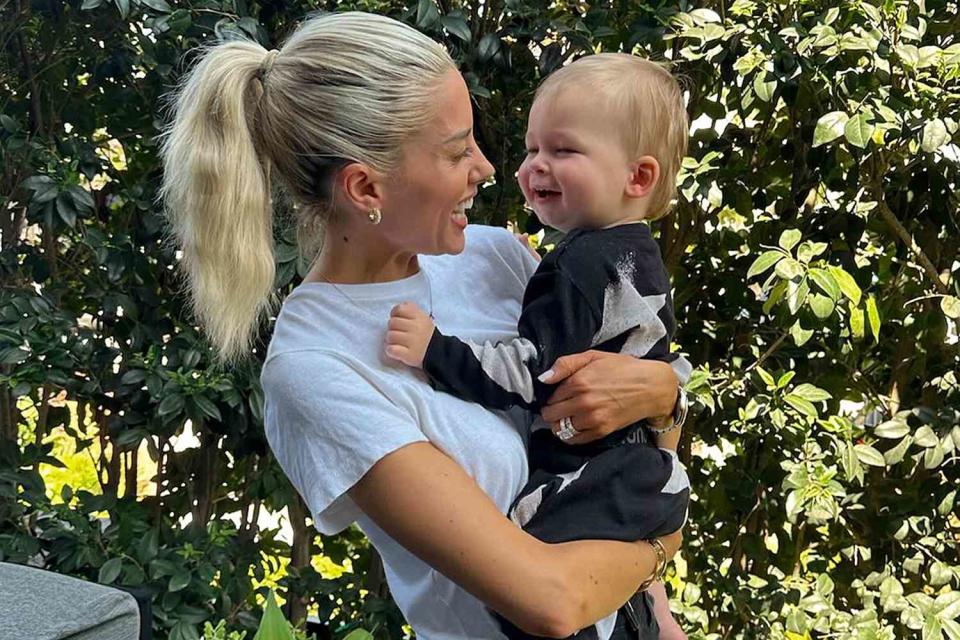 <p>Heather Rae El Moussa/Instagram</p> Heather Rae El Moussa holds son Tristan