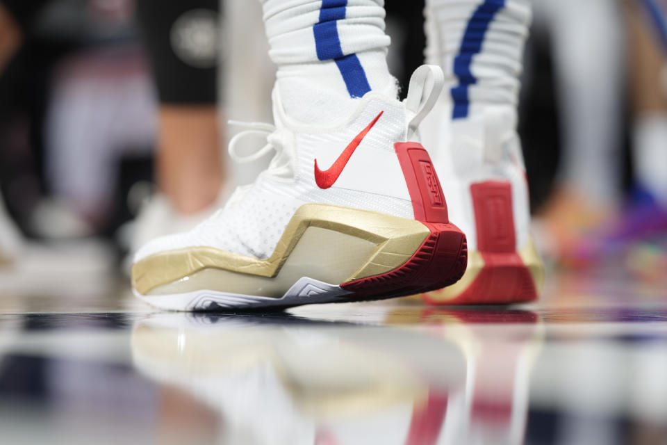 Nike basketball shoes worn by Los Angeles Clippers guard Eric Bledsoe (12) in the second half of an NBA basketball game Wednesday, Jan. 19, 2022, in Denver. The Nuggets won 130-128 in overtime. (AP Photo/David Zalubowski)