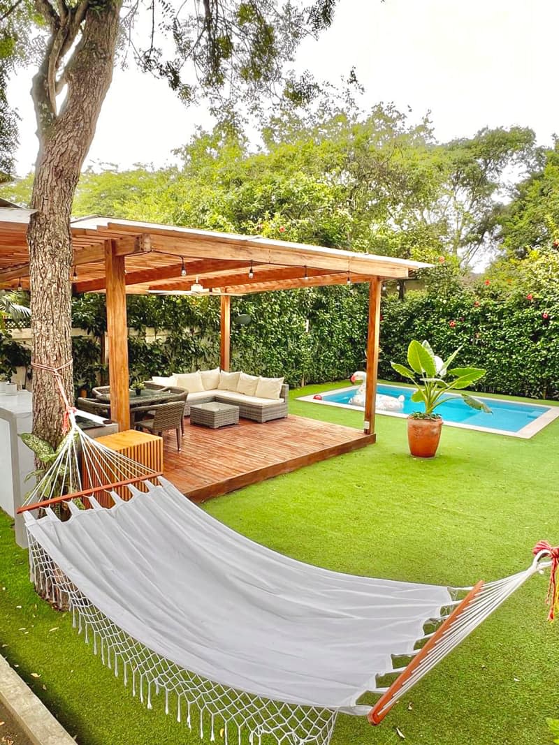 Hammock near outdoor deck.