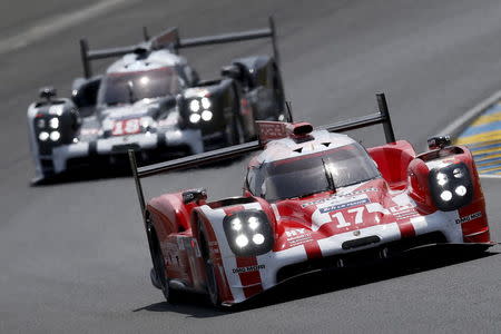 Timo Bernhard of Germany drives his Porsche 919 Hybrid number 17 during the Le Mans 24-hour sportscar race in Le Mans, central France June 13, 2015. The Porsche 919 Hybrid number 17 is also driven by Brendon Hartley of New Zealand and Mark Webber of Australia. REUTERS/Stephane Mahe