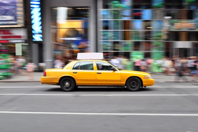 panning shot of a nyc taxi cab...