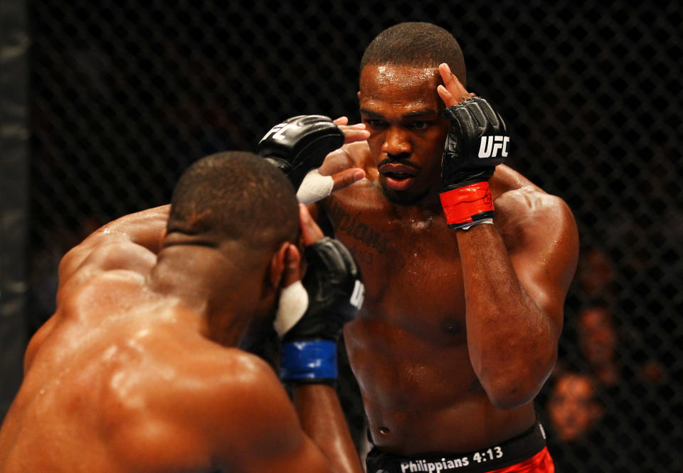 Jon Jones (R) fights Rashad Evans during their light heavyweight title bout for UFC 145 at Philips Arena on April 21, 2012 in Atlanta, Georgia. Jones' decision Thursday to decline to fight Chael Sonnen at UFC 151 on Sept. 1 led to the cancelation of the entire card at the Mandalay Bay Events Center. (Photo by Al Bello/Zuffa LLC/Zuffa LLC via Getty Images)