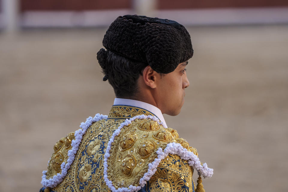 Ecuadorian bullfighter Mario Navas looks on before a bullfight with young bulls at Las Ventas bullring in Madrid, Spain, Sunday, March 26, 2023. The death of Spanish bullfighting has been declared many times, but the number of bullfights in the country is at its highest level in seven years, and the young are the most consistent presence as older groups of spectators drop away. (AP Photo/Manu Fernandez)