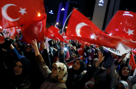 Supporters of AK Party wave flags in Ankara, Turkey April 1, 2019. REUTERS/Umit Bektas