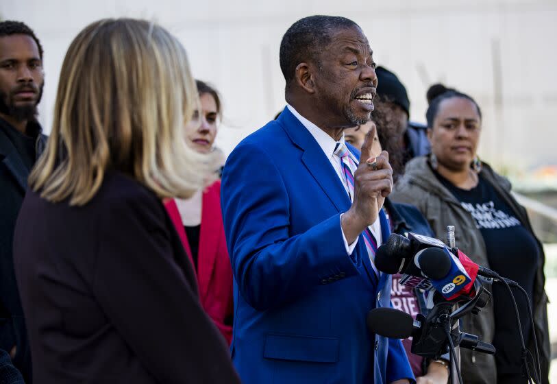 Attorney Carl Douglas announces the filing of a federal lawsuit against the LAPD on behalf of Melina Abdullah