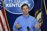 Kentucky Governor Andy Beshear addresses the media following the return of a grand jury investigation into the death of Breonna Taylor at the Kentucky State Capitol in Frankfort, Ky., Wednesday, Sept. 23, 2020. Gov. Beshear has made a request to the Kentucky Attorney General Daniel Cameron to release the grand jury transcripts to the public. (AP Photo/Timothy D. Easley)