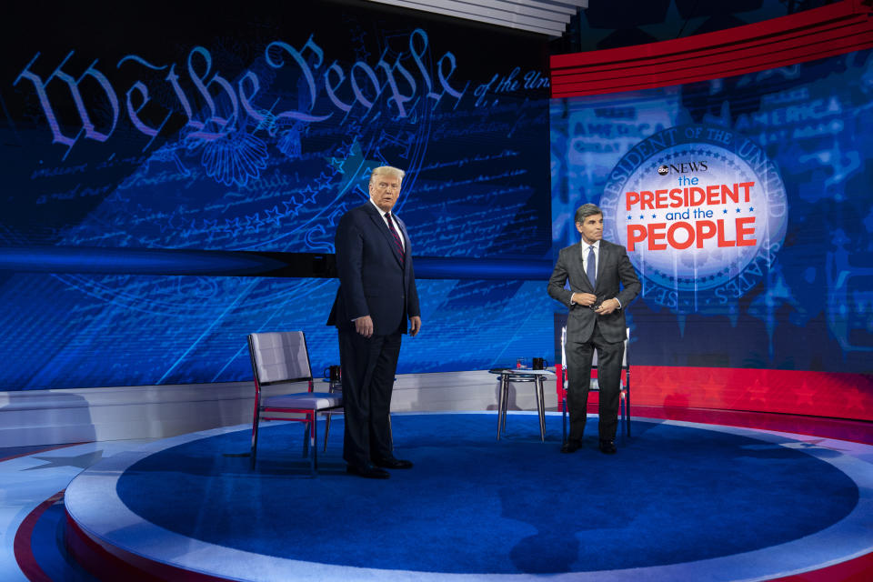 President Donald Trump and ABC News anchor George Stephanopoulos arrive to tape a town hall at National Constitution Center, Tuesday, Sept. 15, 2020, in Philadelphia. (AP Photo/Evan Vucci)