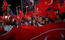 People shout slogans and wave Turkish national flags as they gather in solidarity night after night since the July 15 coup attempt in central Ankara, Turkey, July 27, 2016. REUTERS/Umit Bektas