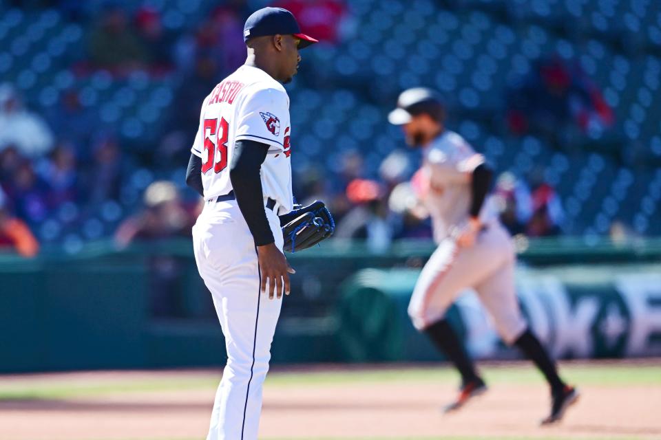 Cleveland Guardians relief pitcher Anthony Castro waits for San Francisco Giants' Brandon Belt to run the bases after hitting a two-run home run in the seventh inning of a baseball game, Sunday, April 17, 2022, in Cleveland. (AP Photo/David Dermer)