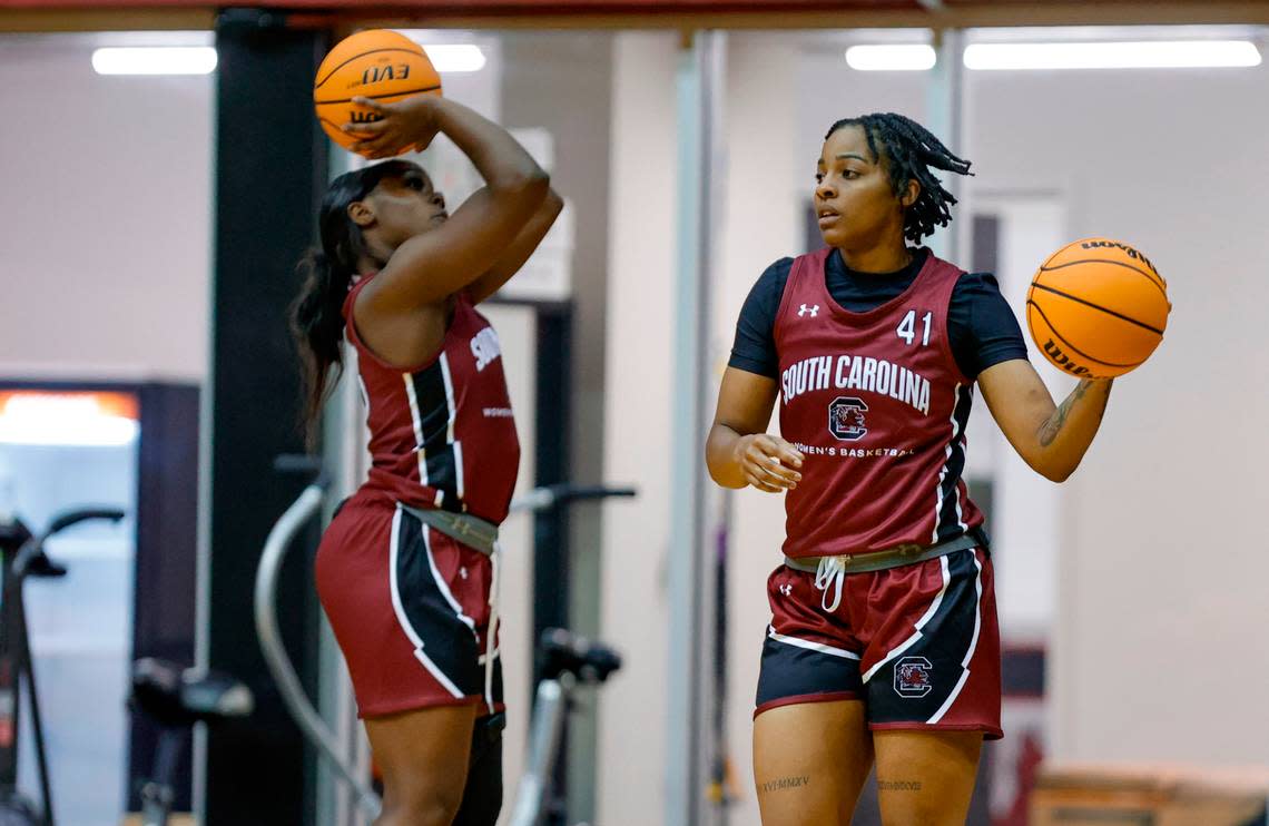 Raven Johnson (25) and Kierra Fletcher (41) shoot the ball as the Gamecocks hold their first team practice in the Carolina Coliseum on Wednesday, Sept. 28, 2022.