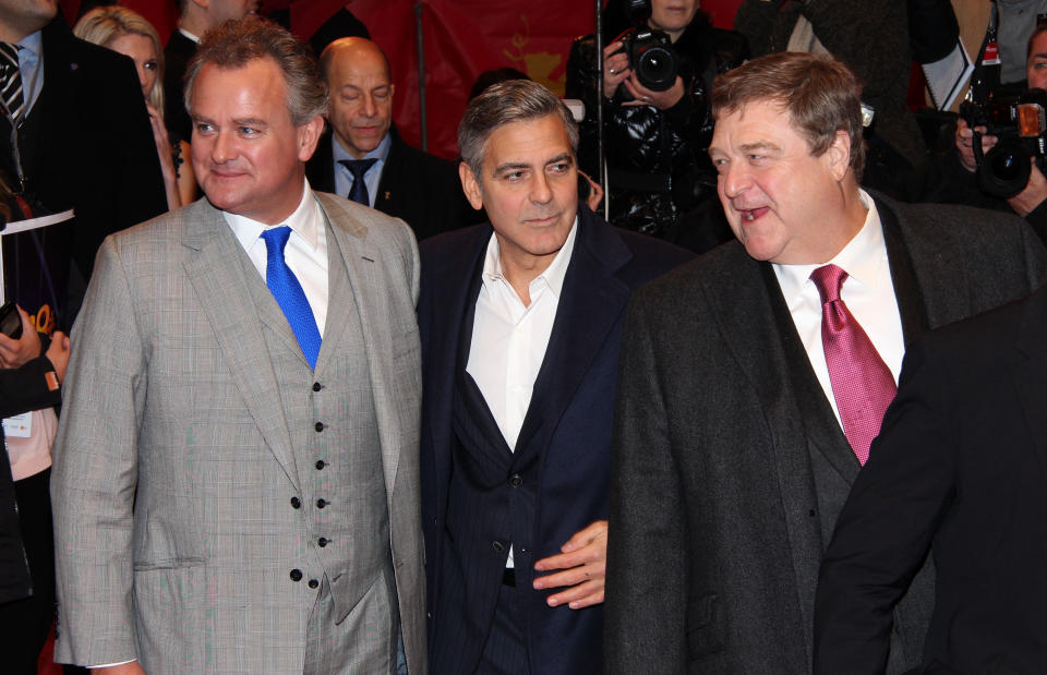 BERLIN, GERMANY - FEBRUARY 08: (L-R) Actors Hugh Bonneville, George Clooney and John Goodman attend 'The Monuments Men' premiere during 64th Berlinale International Film Festival at Berlinale Palast on February 8, 2014 in Berlin, Germany. (Photo by Anita Bugge/WireImage)