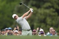 Rory McIlroy, of Northern Ireland, hits on the 10th hole during a practice round in preparation for the Masters golf tournament at Augusta National Golf Club Tuesday, April 9, 2024, in Augusta, Ga. (AP Photo/Ashley Landis)