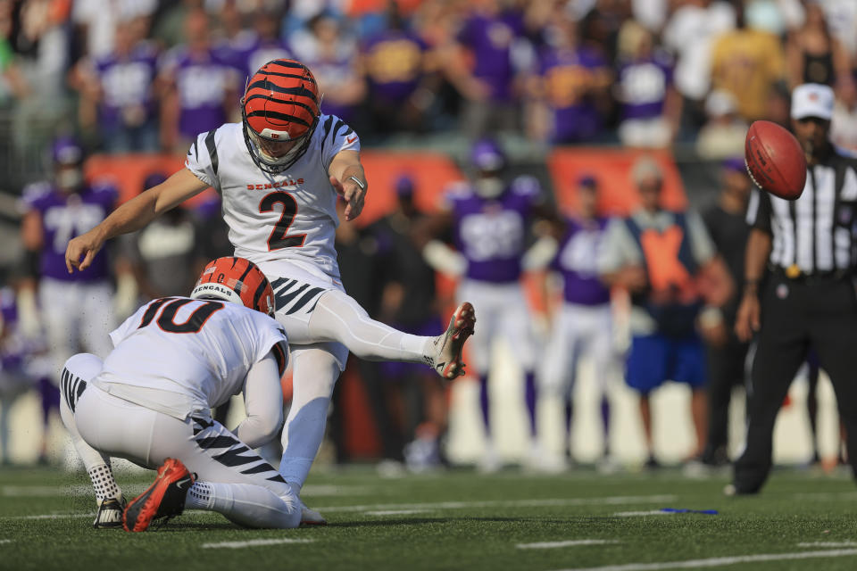 Cincinnati Bengals kicker Evan McPherson (2) hits a field goal to defeat the Minnesota Vikings during overtime of an NFL football game, Sunday, Sept. 12, 2021, in Cincinnati. The Bengals won 27-24. (AP Photo/Aaron Doster)