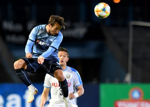 Sydney FC's Adam le Fondre displayed his enduring predatory instincts to keep Shanghai SIPG at bay