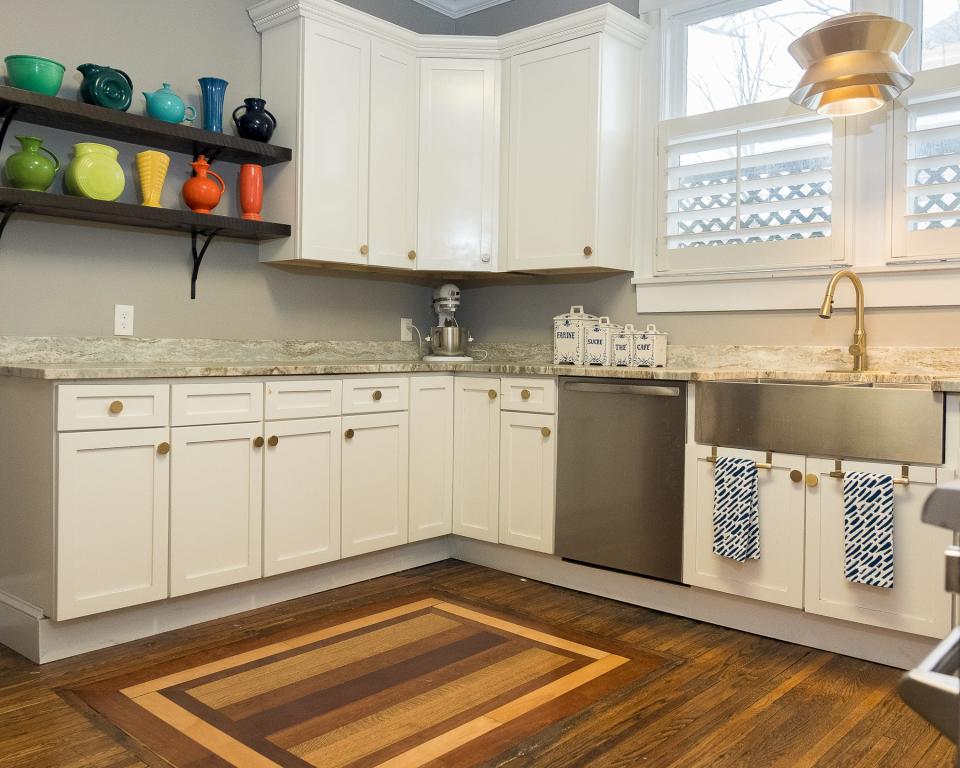 Thanks to a previous owner, the kitchen floor has an inlaid wood feature that shows off different tones.