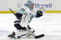 Seattle Kraken goaltender Philipp Grubauer (31) makes a save in the second period of an NHL hockey game against the New York Islanders on Wednesday, Feb. 2, 2022, in Elmont, N.Y. (AP Photo/Adam Hunger)