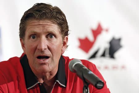 Head coach Mike Babcock answers questions during a Hockey Canada news conference in Calgary, Alberta, in this file photo taken August 25, 2013. REUTERS/Todd Korol/Files