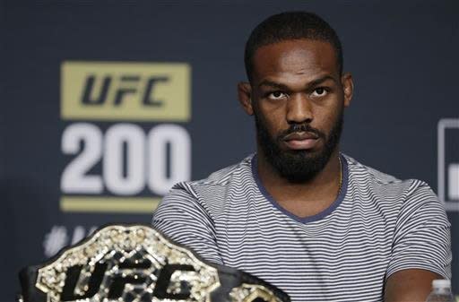 Jon Jones attends a UFC 200 mixed martial arts news conference, Wednesday, July 6, 2016, in Las Vegas. Jones is scheduled to fight Daniel Cormier in a light heavyweight championship fight at UFC 200 on Saturday. (AP Photo/John Locher)