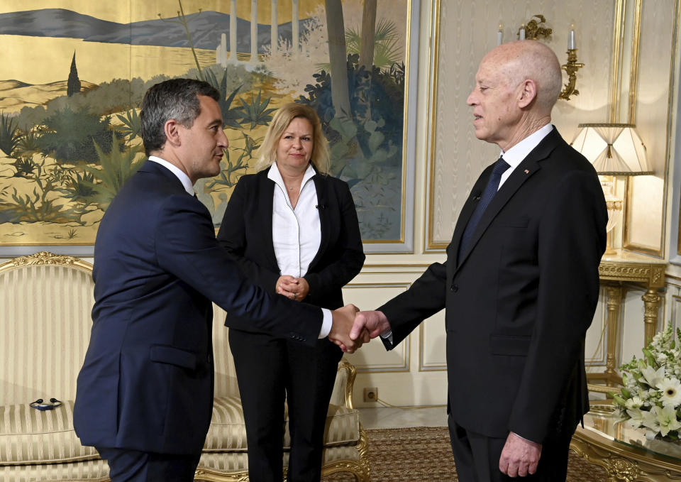 CORRECTS BYLINE Tunisian President Kais Saied, right, welcomes French Interior Minister Gerald Darmanin, left, and German Interior Minister Nancy Faeser to the presidential palace in Carthage, Tunisia, Monday June 19, 2023. (Slim Abid/Tunisian Presidential Palace via AP)