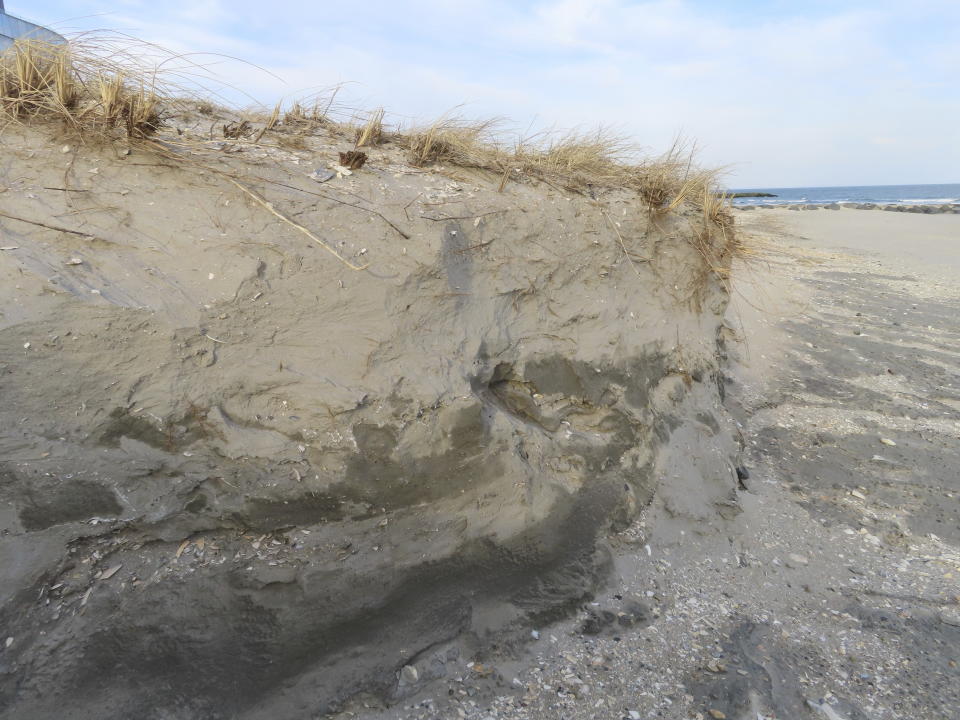 This March 13, 2024 photo shows an eroded beach in front of the Ocean Casino Resort in Atlantic City, N.J. The Ocean, Resorts and Hard Rock casinos want the federal government to accelerate a beach replenishment project so that they have usable beaches this summer, but the U.S. Army Corps of Engineers says it could be fall before the work begins. (AP Photo/Wayne Parry)