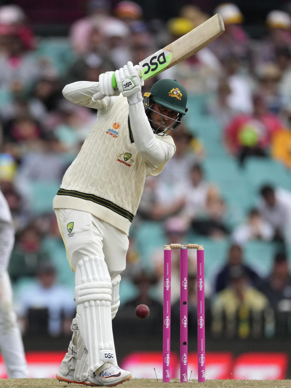 Australia's Usman Khawaja bats against South Africa during the second day of their cricket test match at the Sydney Cricket Ground in Sydney, Thursday, Jan. 5, 2023. (AP Photo/Rick Rycroft)