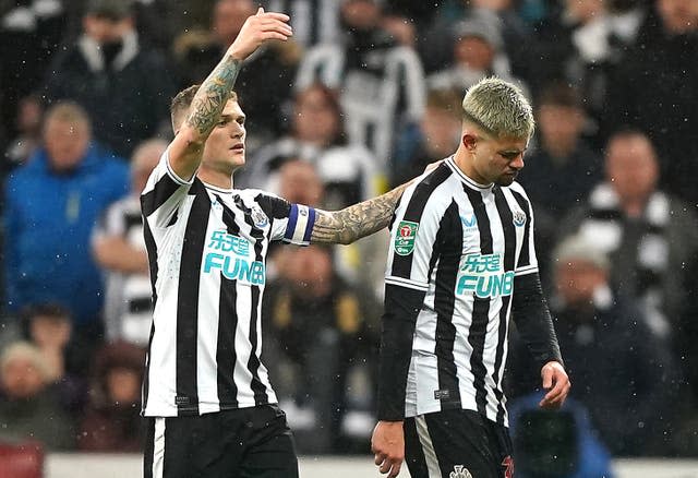 Bruno Guimaraes, right, leaves the field after his red card