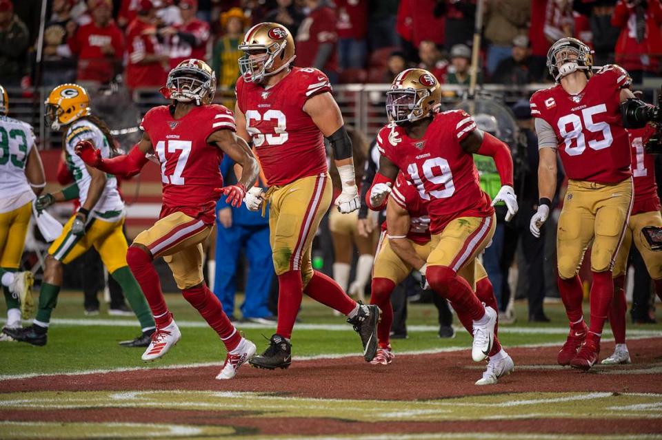 San Francisco 49ers celebrate after running back Raheem Mostert (31) scored a touchdown in the fourth quarter against the Green Bay Packers during the NFC Championship at Levi’s Stadium on Sunday, Jan. 19, 2020 in Santa Clara.