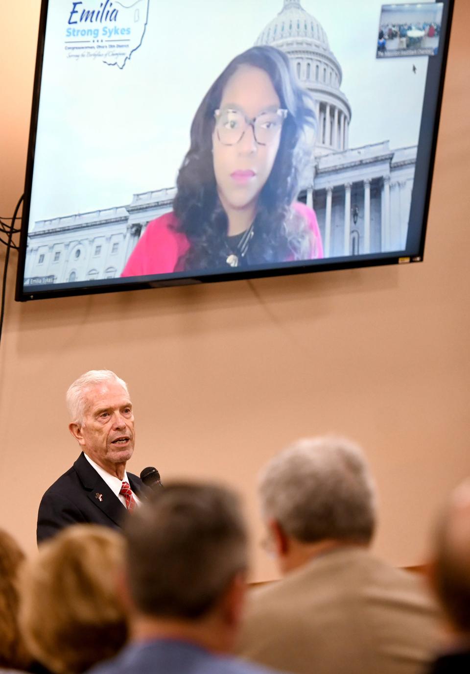 Congresswoman Emilia Strong Sykes on screen and Congressman Bill Johnson answer question during The Massillon WestStark Chamber of Commerce annual legislative breakfast at Fraternal Order of Eagles in Massillon.  Friday,  March 03, 2023.