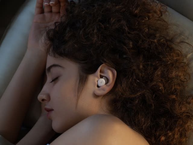 Anker Soundcore Sleep A20 earbuds worn while sleeping on side