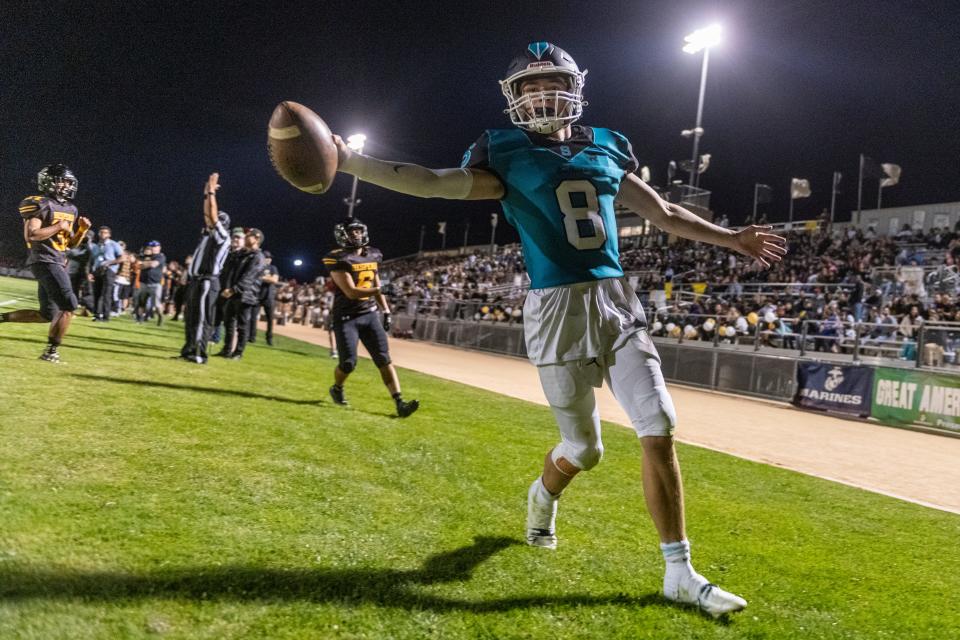Sultana's Jacob Higgs celebrates after scoring a go-ahead touchdown in the fourth quarter against Hesperia in the Key Game on Friday, Sept. 30, 2022.