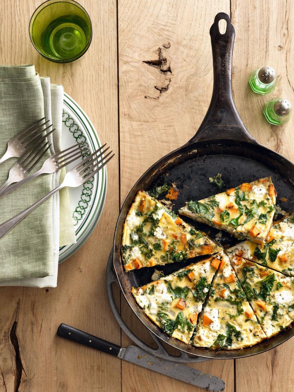 <p>Serve breakfast for dinner one night this week. Sauté sweet potatoes and kale until tender, then add them to your egg mixture and sprinkle creamy goat cheese crumbles on top before baking. </p><p><em><a href="https://www.womansday.com/food-recipes/food-drinks/recipes/a39769/sweet-potato-kale-frittata-recipe-clx0914/" rel="nofollow noopener" target="_blank" data-ylk="slk:Get the Sweet Potato Kale Frittata recipe.;elm:context_link;itc:0;sec:content-canvas" class="link ">Get the Sweet Potato Kale Frittata recipe.</a></em></p>
