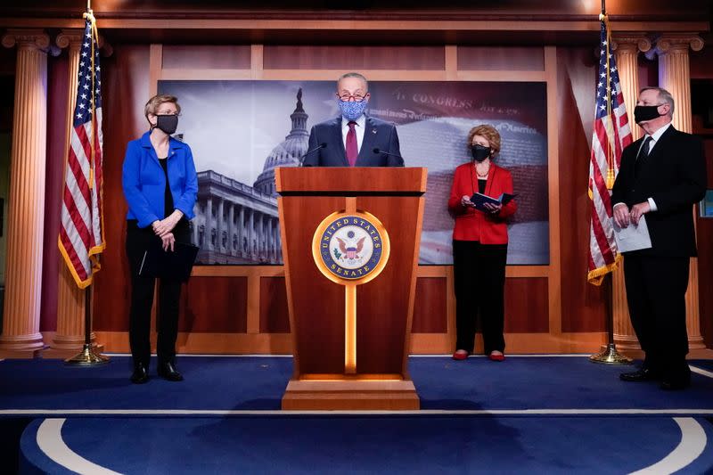 Senate Minority Leader Schumer and other Democratic Senators participate in a press conference at the U.S. Capitol in Washington