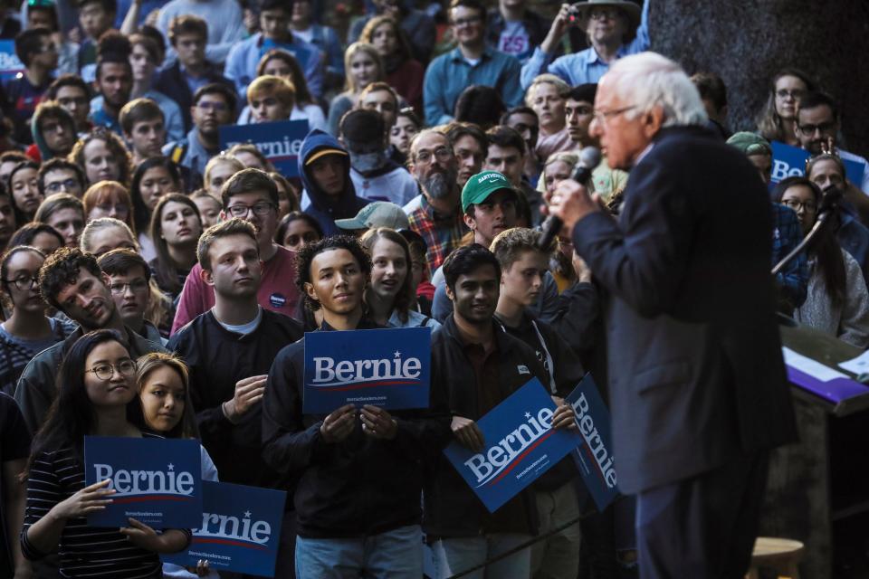 Students listen as Democratic presidential candidate Sen. Bernie Sanders, I-Vt., speaks campaign event Sunday, Sept. 29, 2019, at Dartmouth College in Hanover, N.H. (AP Photo/Cheryl Senter)