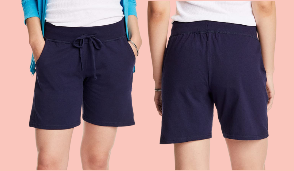 woman wearing navy blue shorts, front and back view