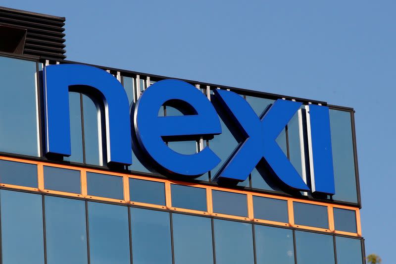 FILE PHOTO: The logo of Italian payments group Nexi is pictured outside their headquarters in Milan