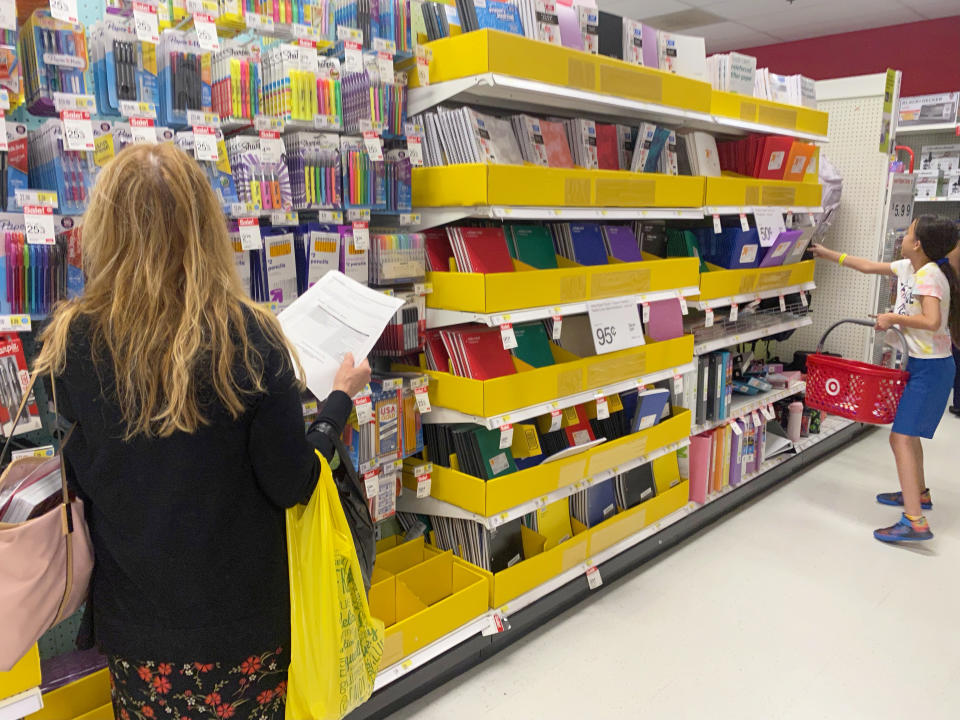 Mother and daughter shopping for back to school supplies using school issued supply list, Target, Queens, New York. (Photo by: Lindsey Nicholson/UCG/Universal Images Group via Getty Images)