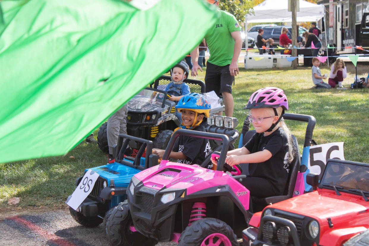 Kids get set to take off from the starting line during the first annual Adel Parks and Rec Power Wheels Nationals on Saturday, Oct. 1, 2022, at Kinnick-Feller Park in Adel.