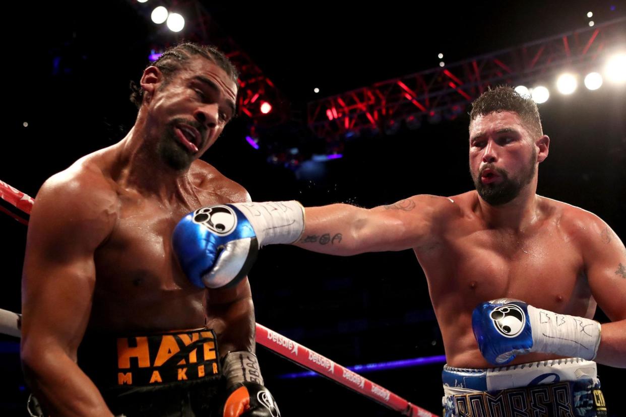 Hit parade: Tony Bellew lands a right on David Haye on his way to a shock win over the former heavyweight world champion: PA