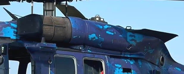 A closer look at one of the new particle separators on the MH-60M. Also visible here is one of the upturned engine exhausts, a feature found on all H-60M variants that helps reduce the helicopter's infrared situation and protect it from heat-seeking missiles. <em>Pryor Field Airport Authority</em>