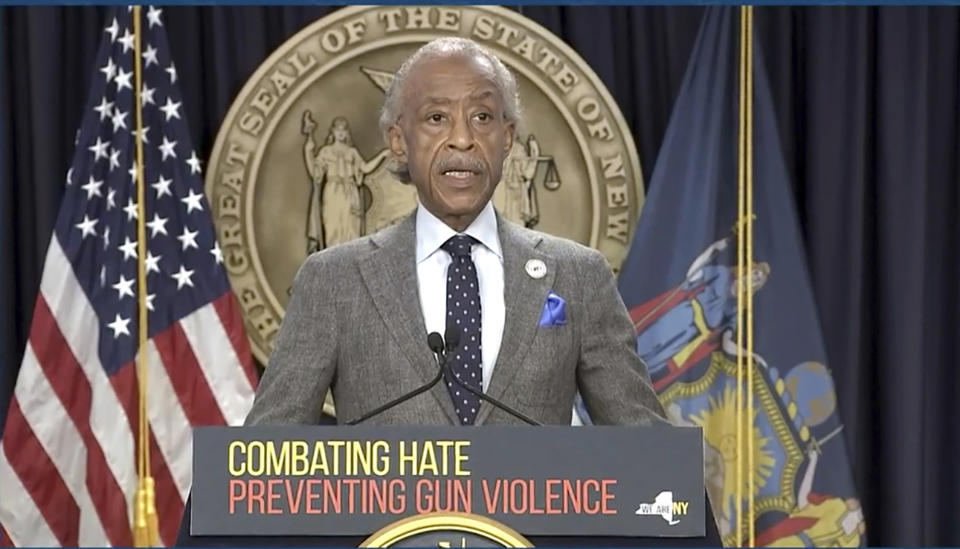 In this image taken from video, Rev. Al Sharpton speaks during a news conference by Gov. Kathy Hochul, Wednesday, May 18, 2022, in New York. New York would require state police to seek court orders to keep guns away from people who might pose a threat to themselves or others under a package of executive orders and gun control bills touted Wednesday by Hochul in the aftermath of a racist attack on a Buffalo supermarket. (Office of the Governor of New York via AP)