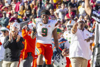 FILE - In this Nov. 2, 2019, file photo, Miami tight end Brevin Jordan (9) celebrates a Miami take away in the first half of an NCAA college football game against Florida State, in Tallahassee, Fla. Jordan was selected to The Associated Press All-Atlantic Coast Conference football team, Tuesday, Dec. 10, 2019. (AP Photo/Mark Wallheiser, File)