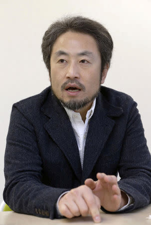 FILE PHOTO: Japanese journalist Jumpei Yasuda speaks during an interview in Tokyo, in this photo taken by Kyodo February 18, 2015. Mandatory credit Kyodo/via REUTERS/File Photo ATTENTION