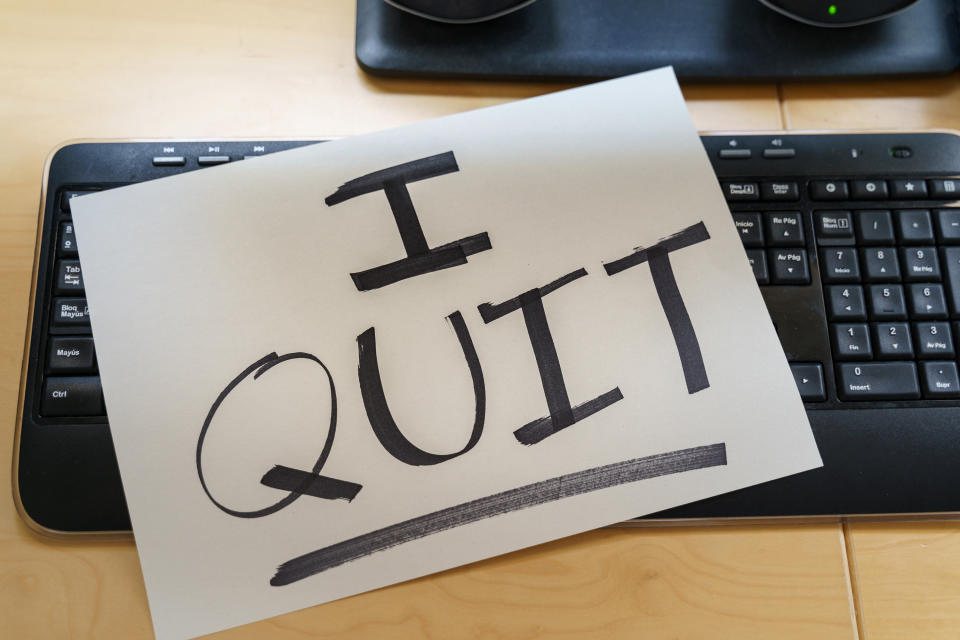 Note on a keyboard that says "I quit"