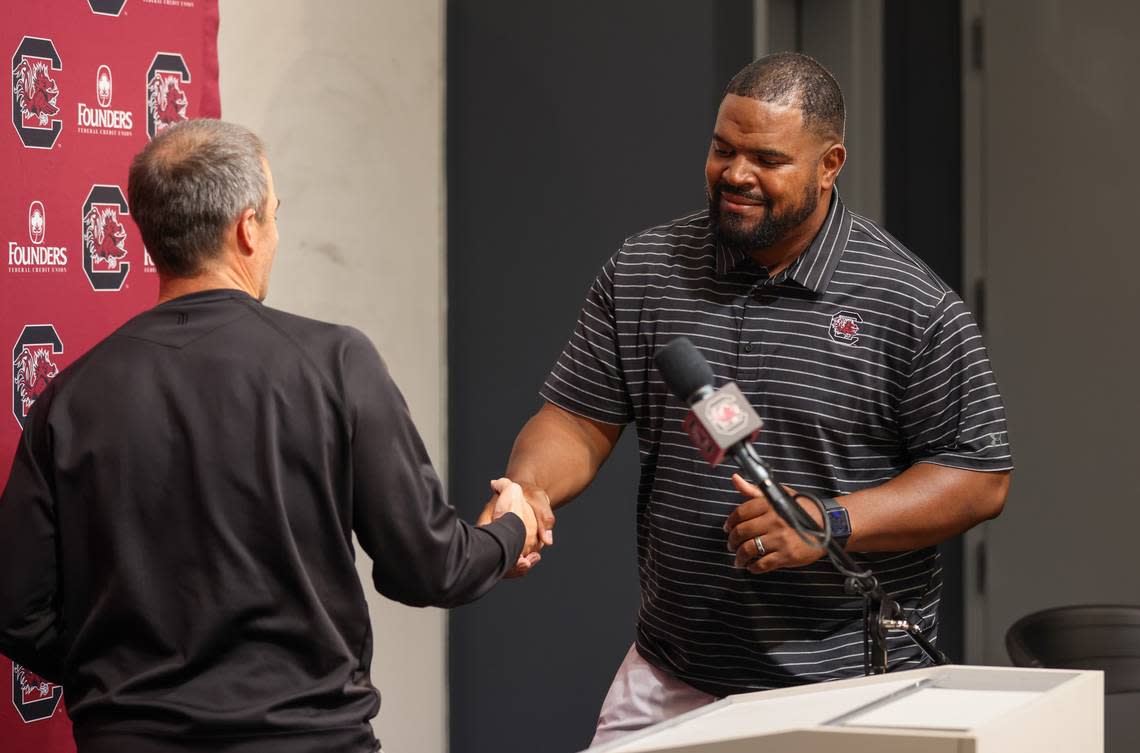 The Gamecocks’ new defensive line coach Travian Robertson is introduced by head coach Shane Beamer during a press conference held Tuesday, May 2, 2023.