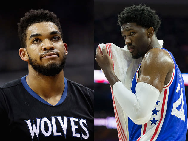 Joel Embiid and Karl-Anthony Towns are ready for their in-game, three-point shootout. (Getty Images)