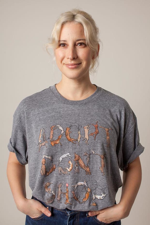 Rachel Antonoff wearing her <a href="https://rachelantonoff.com/products/adopt-dont-shop-tee" rel="nofollow noopener" target="_blank" data-ylk="slk:now-sold-out "Adopt, Don't Stop" tee;elm:context_link;itc:0;sec:content-canvas" class="link ">now-sold-out "Adopt, Don't Stop" tee</a> with artwork by Charlotte Minnett. Photo: Courtesy of Rachel Antonoff