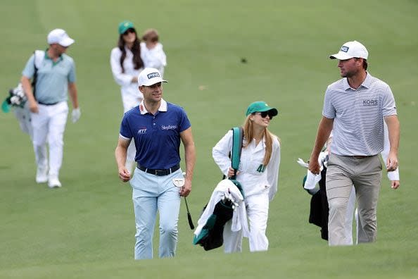 AUGUSTA, GEORGIA - APRIL 10: Taylor Moore of the United States and Austin Eckroat of the United States walk the second hole during the Par Three Contest prior to the 2024 Masters Tournament at Augusta National Golf Club on April 10, 2024 in Augusta, Georgia. (Photo by Jamie Squire/Getty Images) (Photo by Jamie Squire/Getty Images)